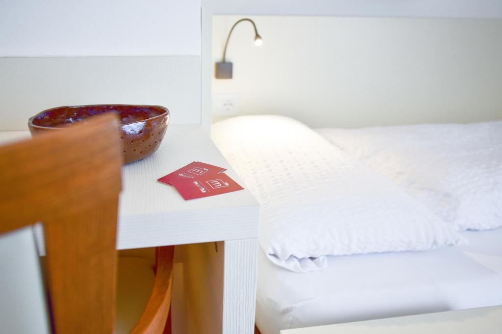 Postel nebo postele na pokoji v ubytování Pension Martha
