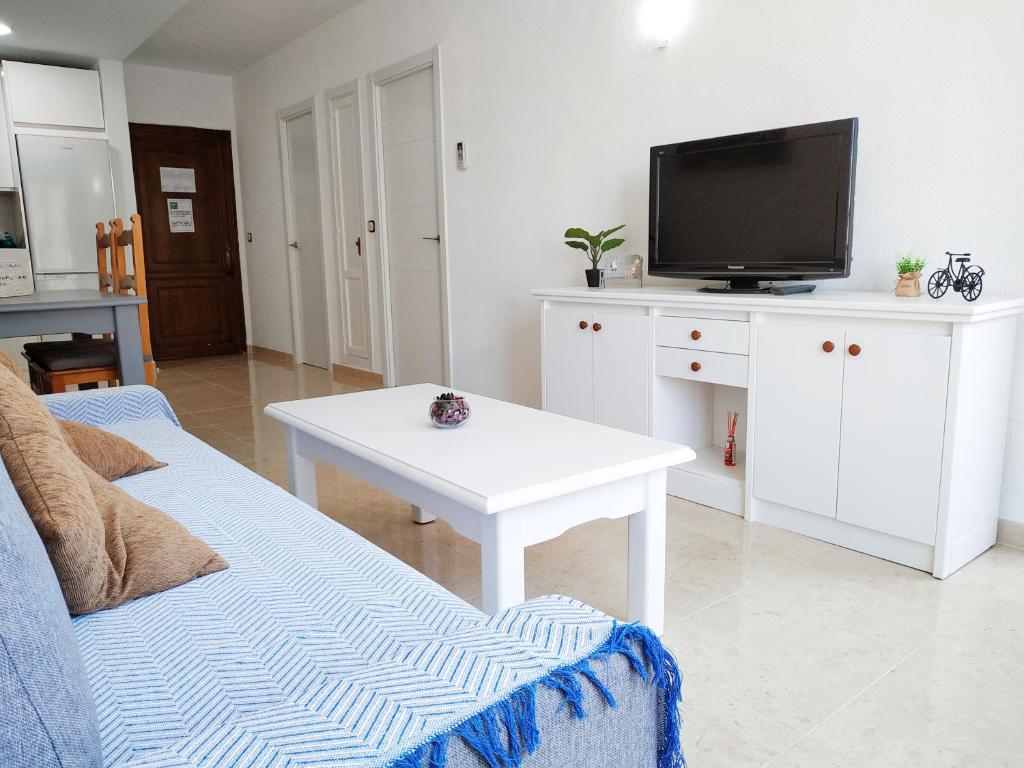 TV a/nebo společenská místnost v ubytování Apartamento Ronda IV - Los Boliches