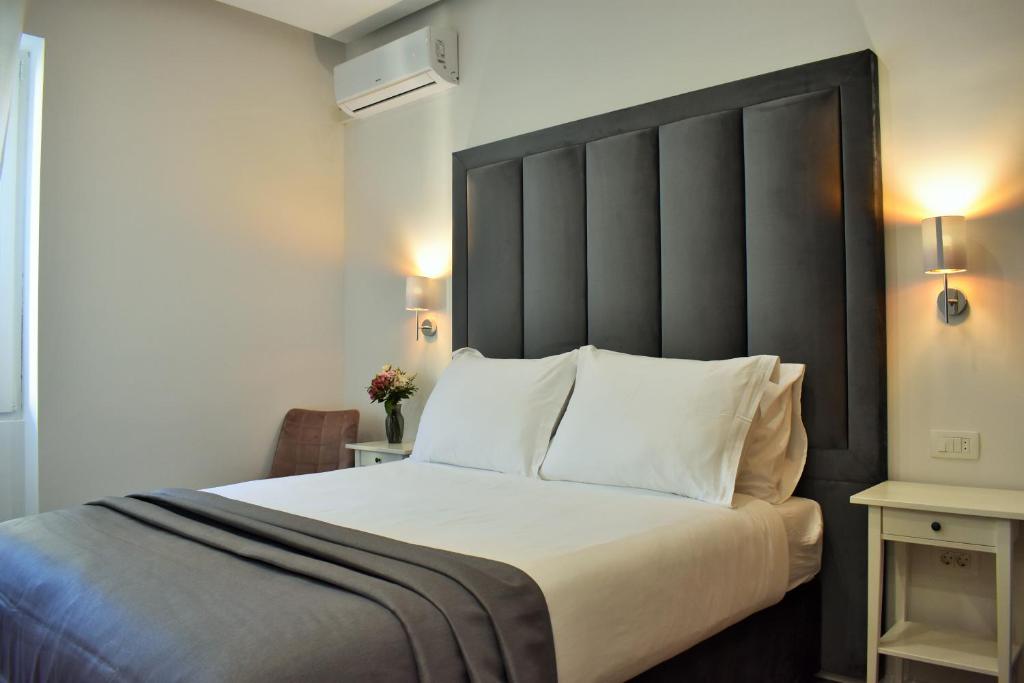 Postel nebo postele na pokoji v ubytování Antares Luxury Rooms