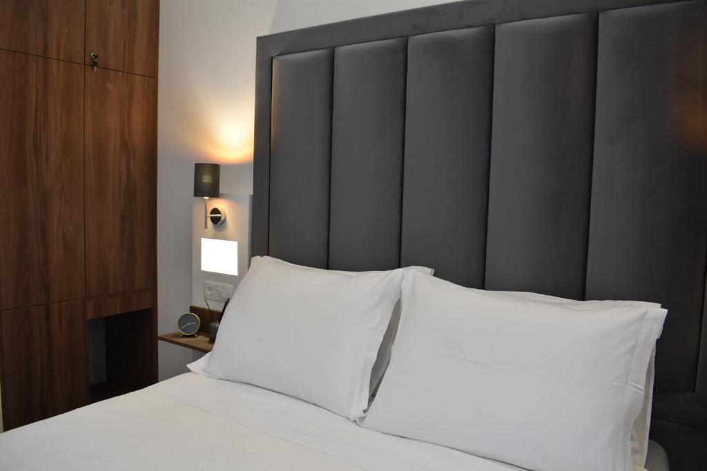 Postel nebo postele na pokoji v ubytování Antares Luxury Rooms