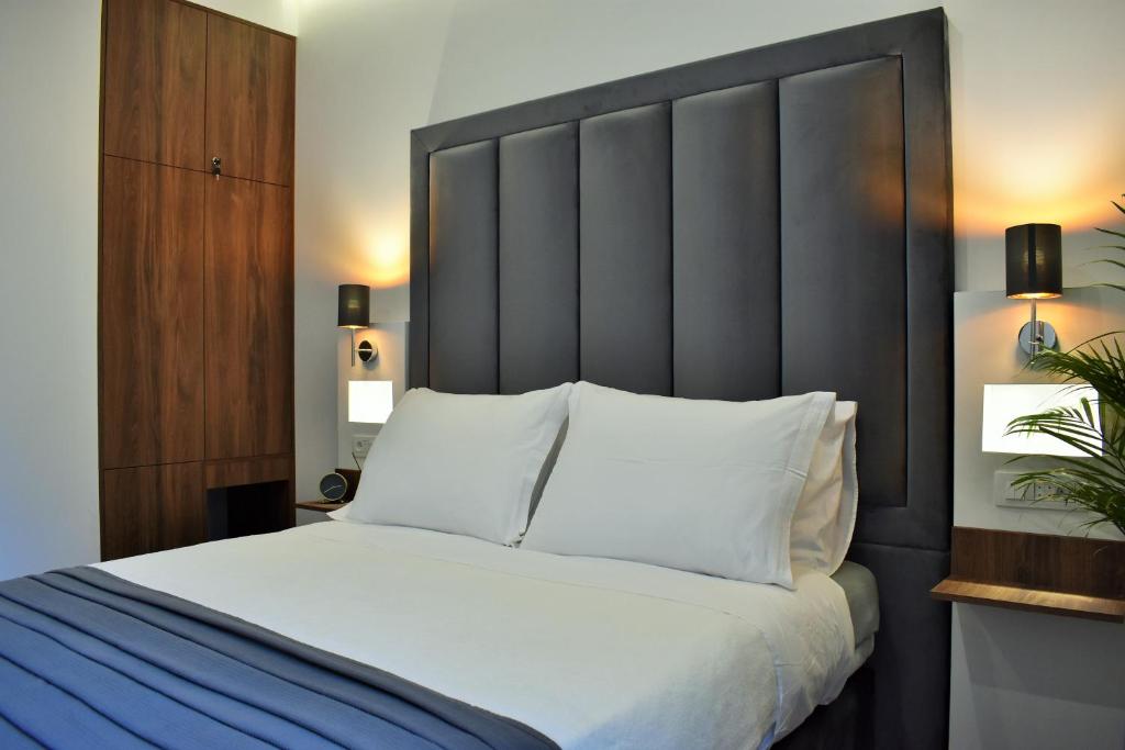 Postel nebo postele na pokoji v ubytování Antares Luxury Rooms