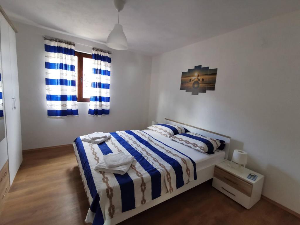 Posteľ alebo postele v izbe v ubytovaní Kuća za odmor obitelji Pedišić