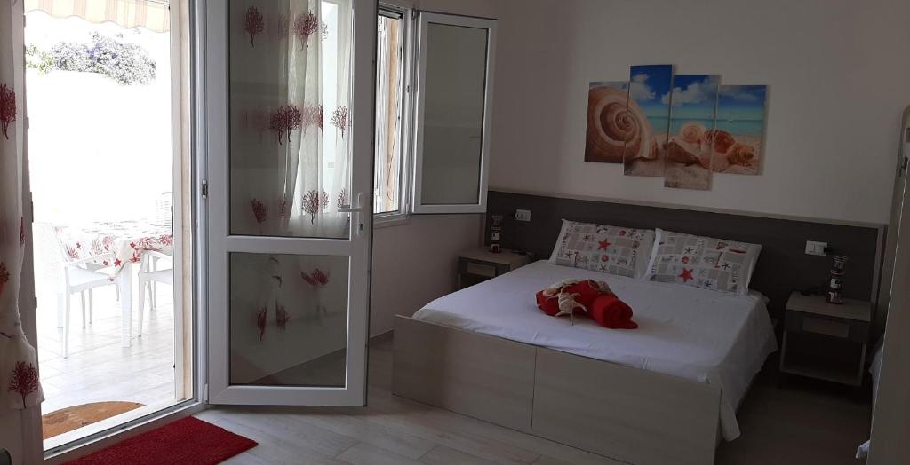 Postel nebo postele na pokoji v ubytování Albachiara