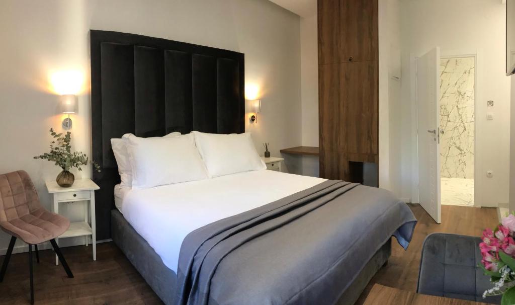 Postel nebo postele na pokoji v ubytování Antares Luxury Rooms