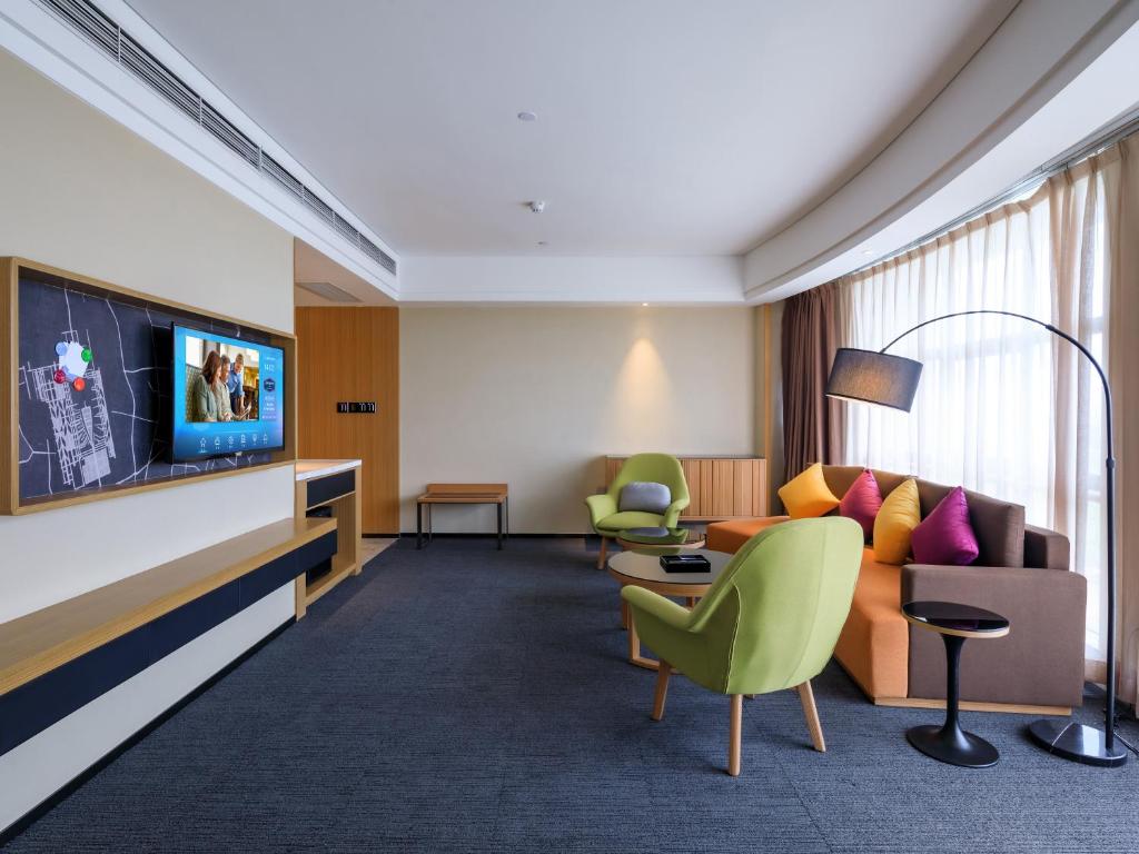 Posezení v ubytování Hampton by Hilton Guangzhou Baiyun Airport North