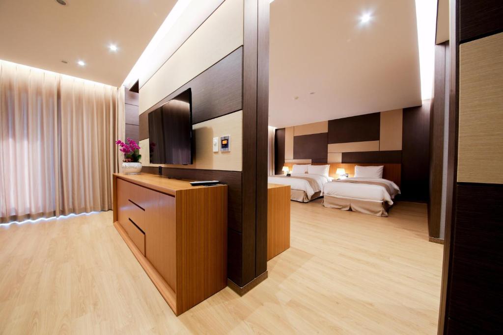 Postel nebo postele na pokoji v ubytování Incheon Stay Hotel