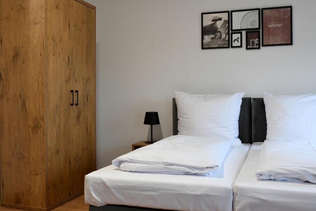 Postel nebo postele na pokoji v ubytování ZatorHome apartamenty - blisko Energylandii i Zatorlandu
