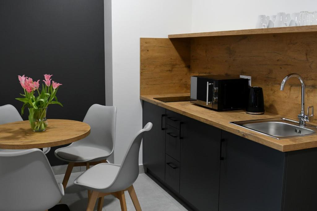 Kuchyň nebo kuchyňský kout v ubytování ZatorHome apartamenty - blisko Energylandii i Zatorlandu
