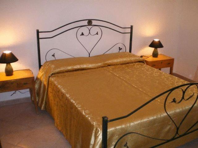 Postel nebo postele na pokoji v ubytování B&B Pacheco