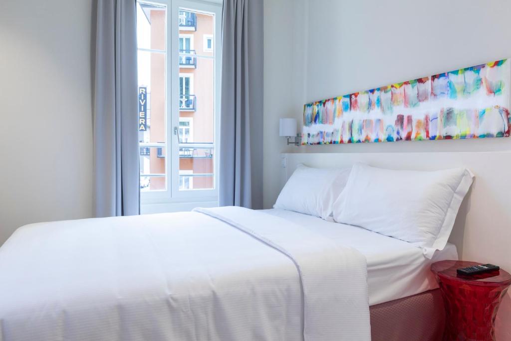 Postel nebo postele na pokoji v ubytování Lac Hotel
