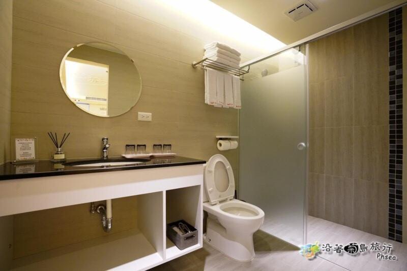 Koupelna v ubytování CHEN FENG HOMESTAY