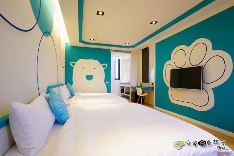 Postel nebo postele na pokoji v ubytování CHEN FENG HOMESTAY