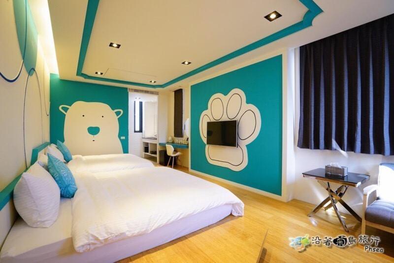 Postel nebo postele na pokoji v ubytování CHEN FENG HOMESTAY