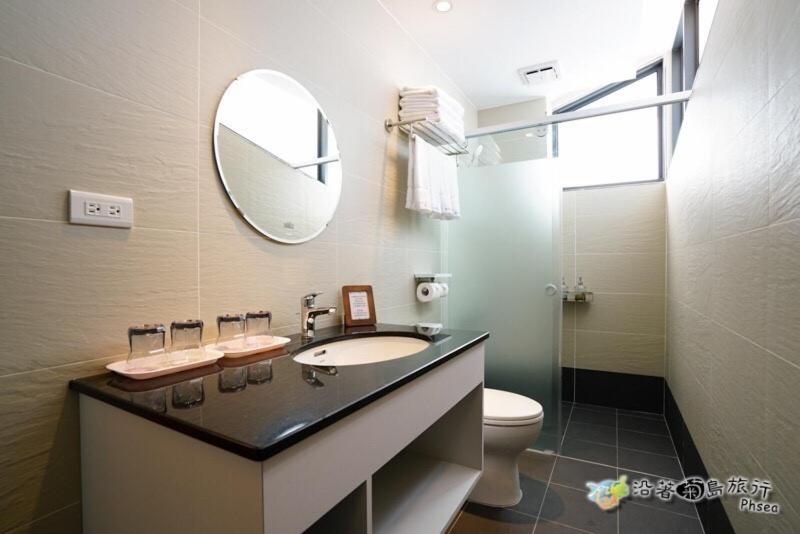 Koupelna v ubytování CHEN FENG HOMESTAY