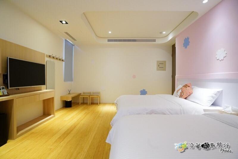 Postel nebo postele na pokoji v ubytování CHEN FENG HOMESTAY