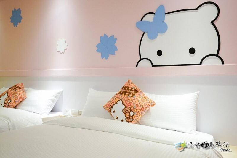 Postel nebo postele na pokoji v ubytování CHEN FENG HOMESTAY