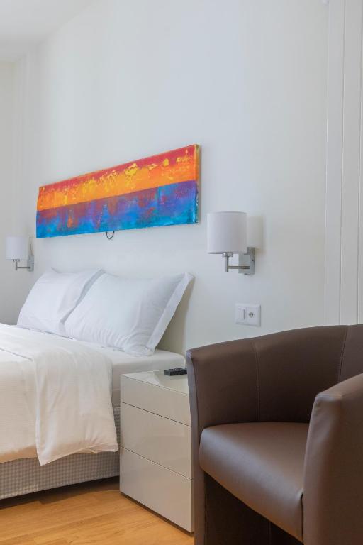 Postel nebo postele na pokoji v ubytování Lac Hotel