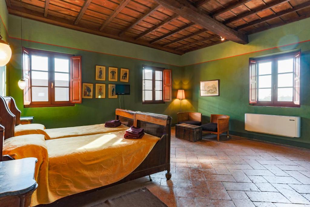 Posezení v ubytování AGRITURISMO LE CORTI DELLA GUALDANA
