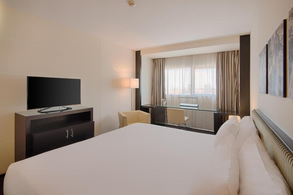 TV a/nebo společenská místnost v ubytování Savhotel Mantegna Padova