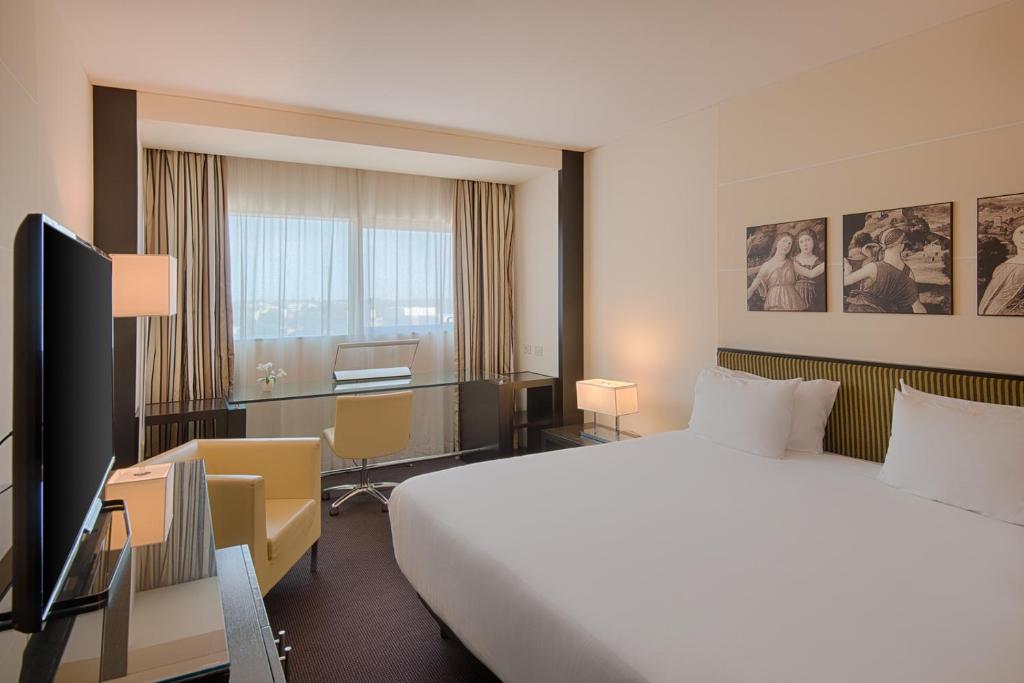 TV a/nebo společenská místnost v ubytování Savhotel Mantegna Padova