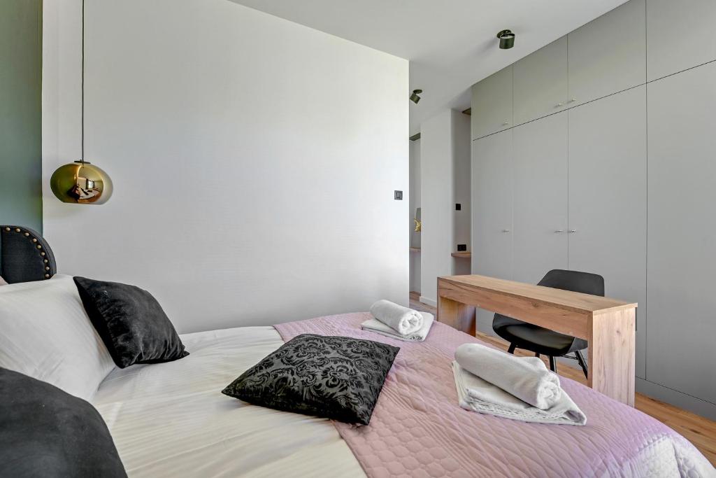 Posteľ alebo postele v izbe v ubytovaní Botanica Premium Apartments