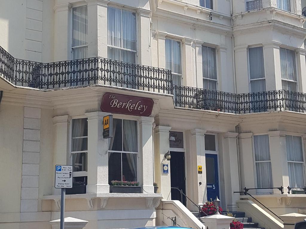 a building with a sign on the side of it at The Berkeley Guesthouse in Eastbourne