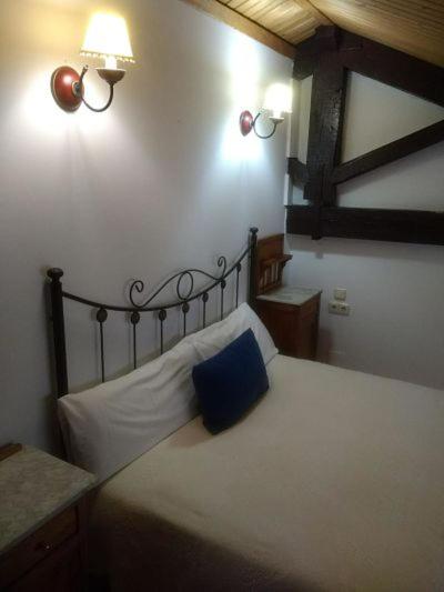 Postel nebo postele na pokoji v ubytování Hotel Charle