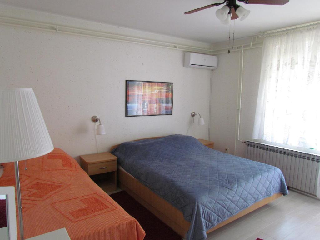 Postel nebo postele na pokoji v ubytování Apartments Bura & Jugo, Cres, without stress