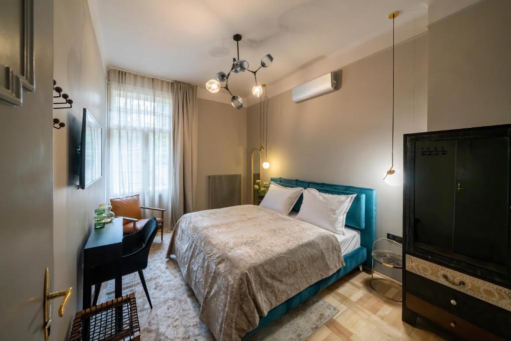 Łóżko lub łóżka w pokoju w obiekcie Nest