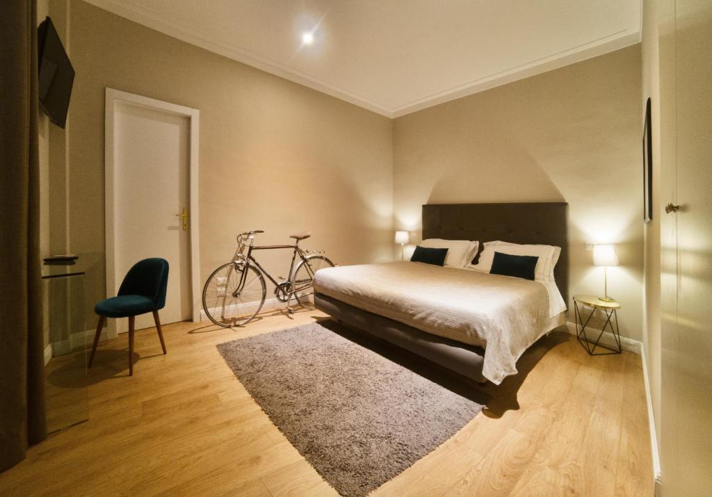 Postel nebo postele na pokoji v ubytování Hotel Touring Wellness & Beauty