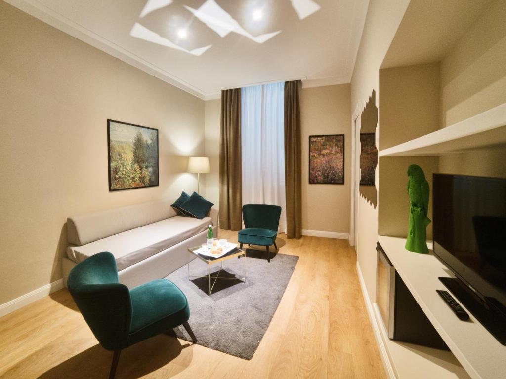 TV a/nebo společenská místnost v ubytování Hotel Touring Wellness & Beauty