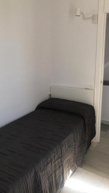 Postel nebo postele na pokoji v ubytování Marbella House Penthouse