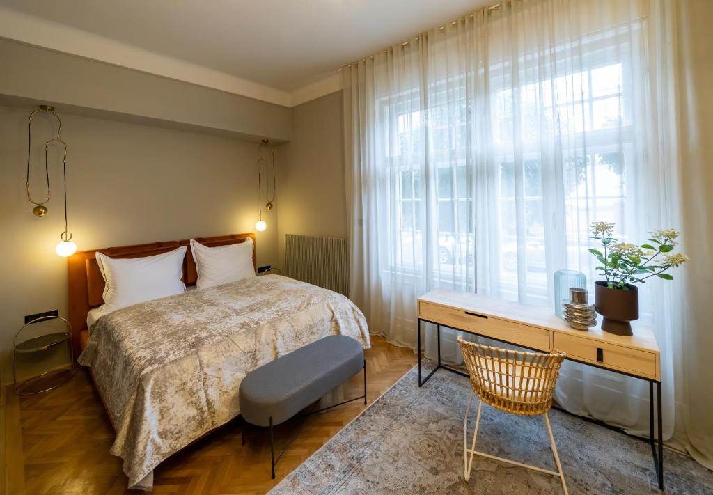 Łóżko lub łóżka w pokoju w obiekcie Nest