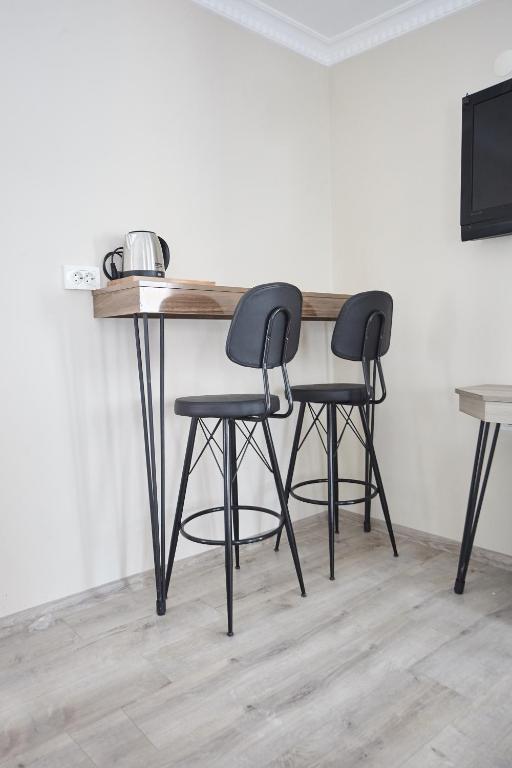 A television and/or entertainment centre at Luna Suites Taksim