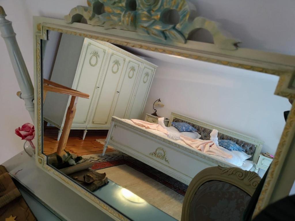 Postel nebo postele na pokoji v ubytování Casa Generalului