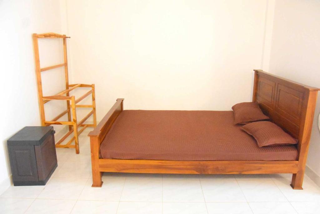 Postel nebo postele na pokoji v ubytování Wingate Hotel Wilgamuwa