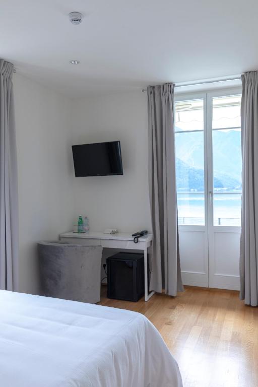 TV a/nebo společenská místnost v ubytování Lac Hotel
