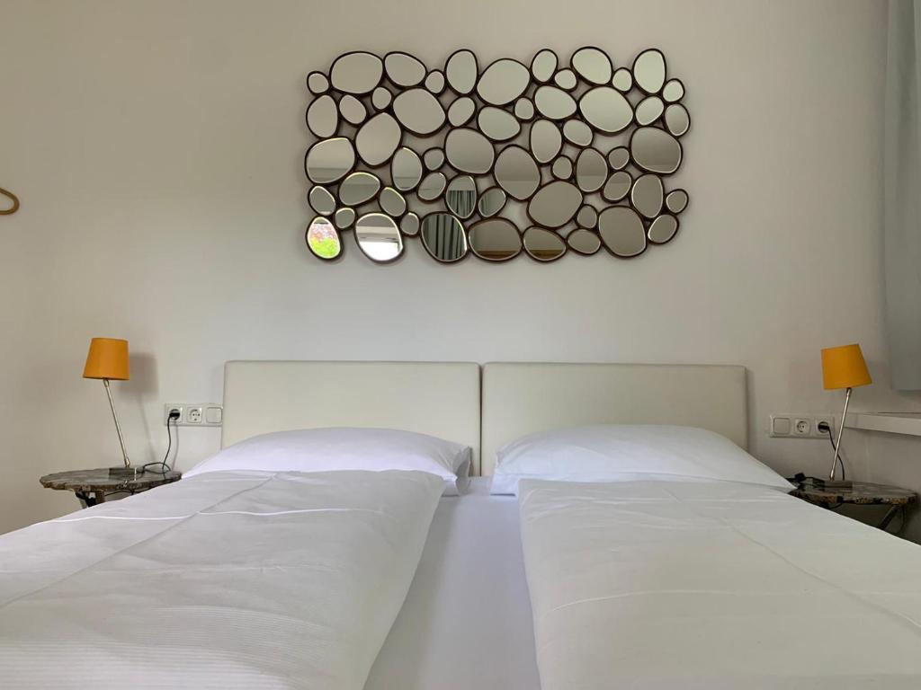 Uma cama ou camas num quarto em Boutique Hotel Oase