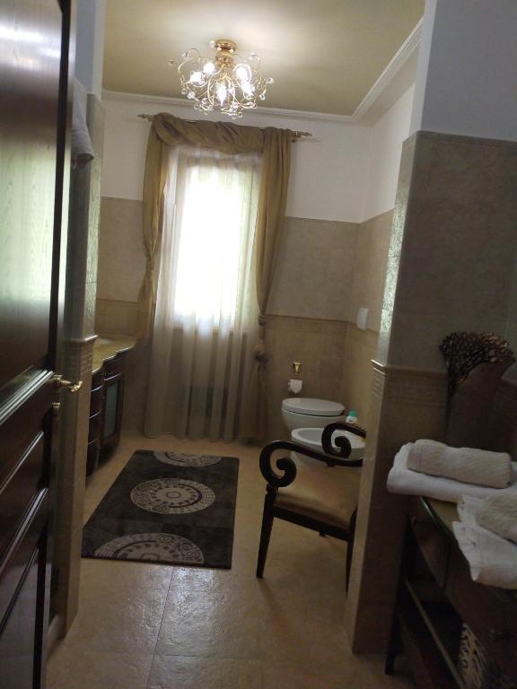 Postel nebo postele na pokoji v ubytování Villa Fontana Saia