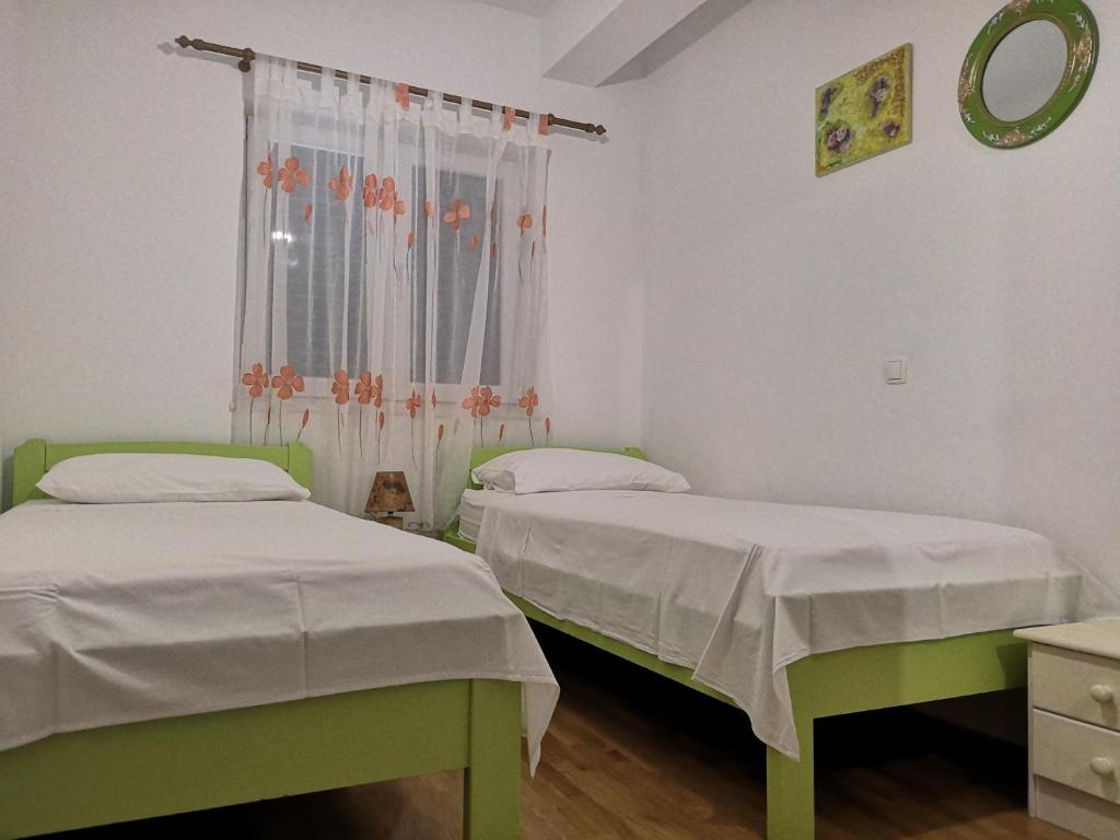 Łóżko lub łóżka w pokoju w obiekcie Villa ForTudor
