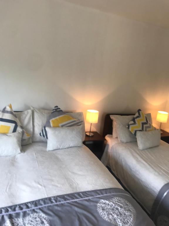Postel nebo postele na pokoji v ubytování Marguerite's B&B