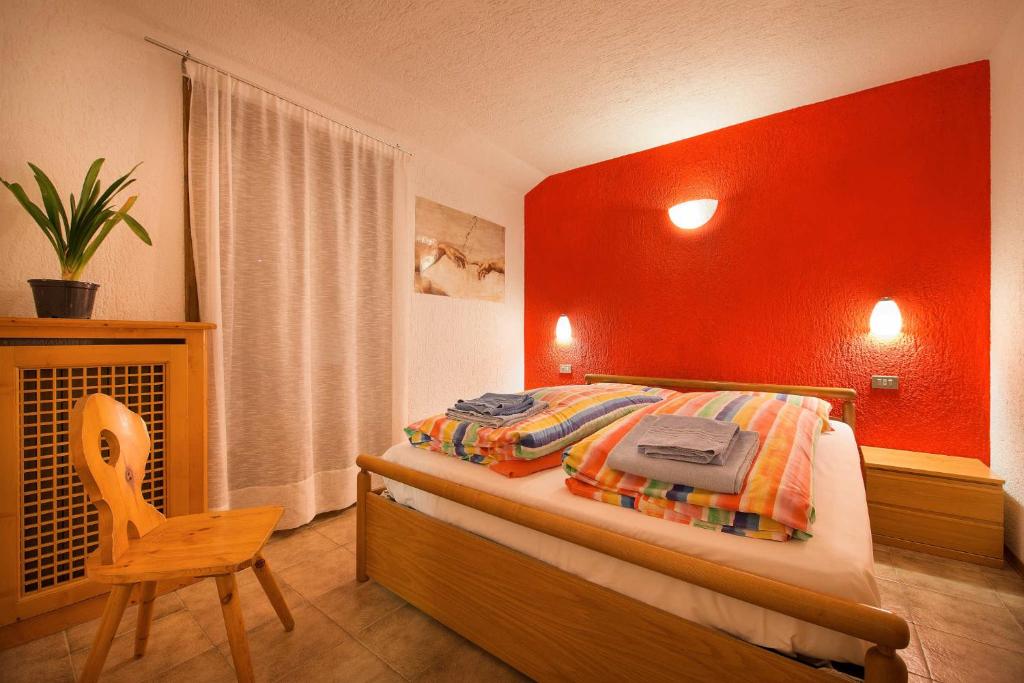 Postel nebo postele na pokoji v ubytování Residence Adele