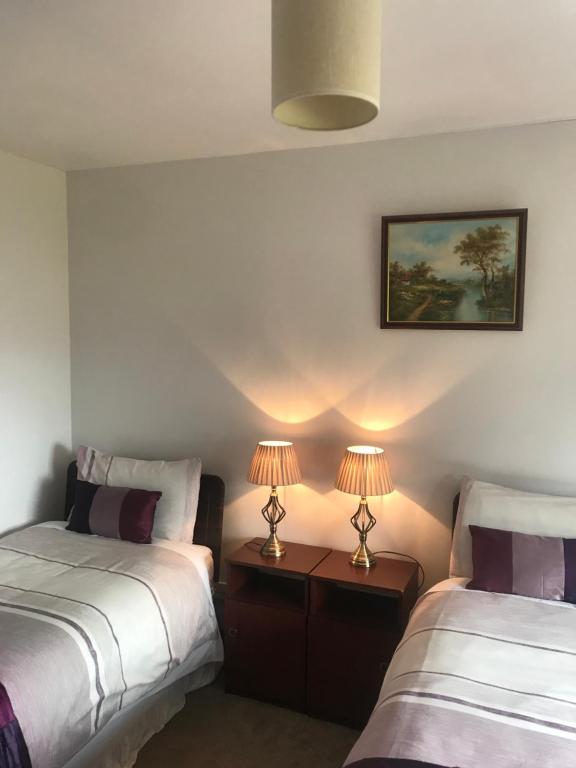Postel nebo postele na pokoji v ubytování Marguerite's B&B