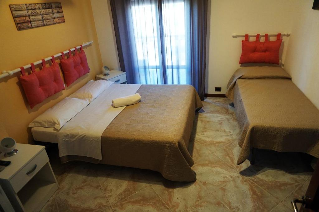 Posteľ alebo postele v izbe v ubytovaní Casa Chiarenza