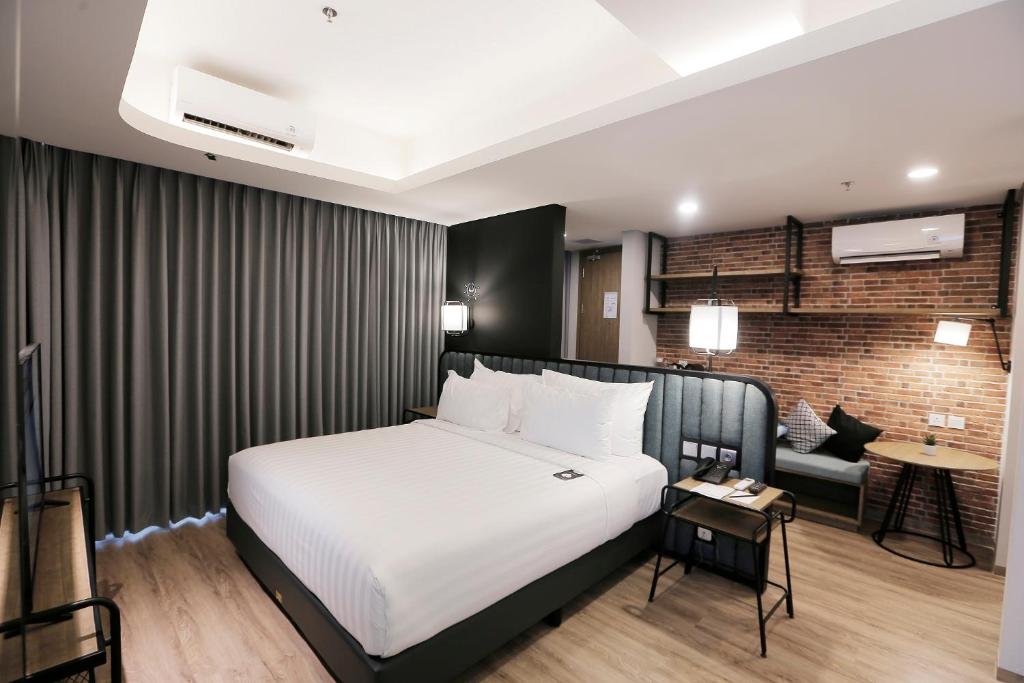 Luminor Hotel Purwokerto By WH - 套房