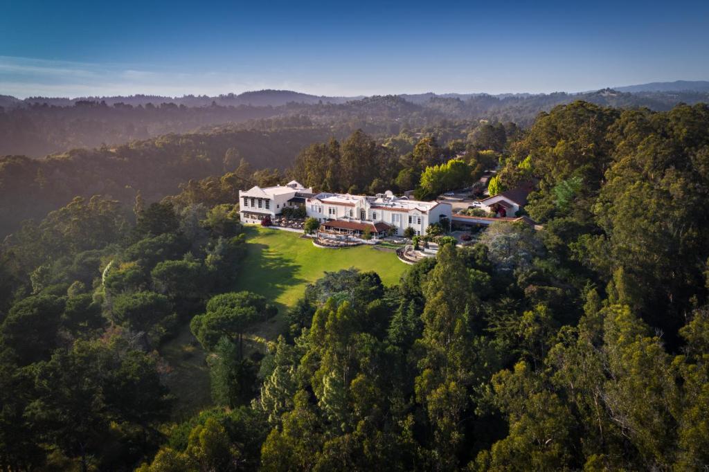 an aerial view of a house in the middle of a forest at Chaminade Resort & Spa in Santa Cruz