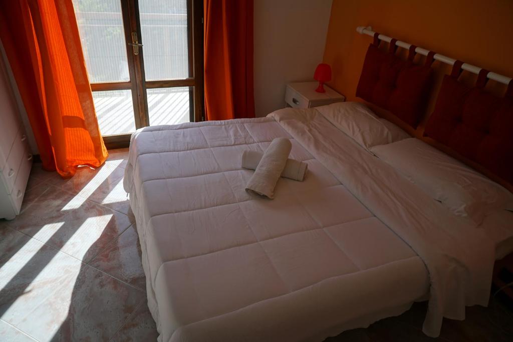 Posteľ alebo postele v izbe v ubytovaní Casa Chiarenza