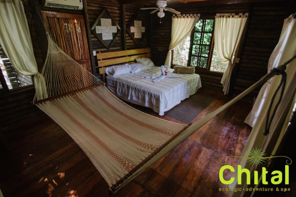 Postel nebo postele na pokoji v ubytování Hotel El Chital