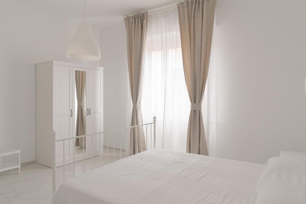 Postel nebo postele na pokoji v ubytování Casa Palanca Camere