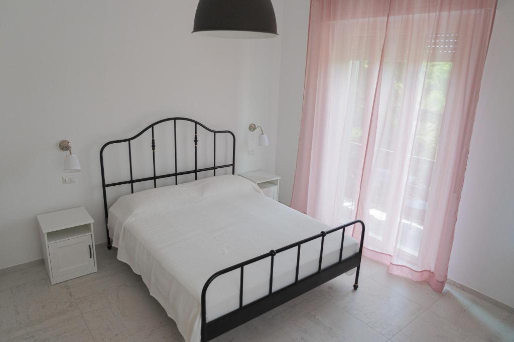 Postel nebo postele na pokoji v ubytování Casa Palanca Camere